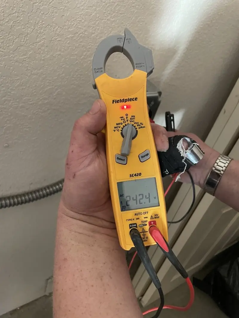 Voltage testing with clamp meter during Electrical Installation Services in Golden Gate